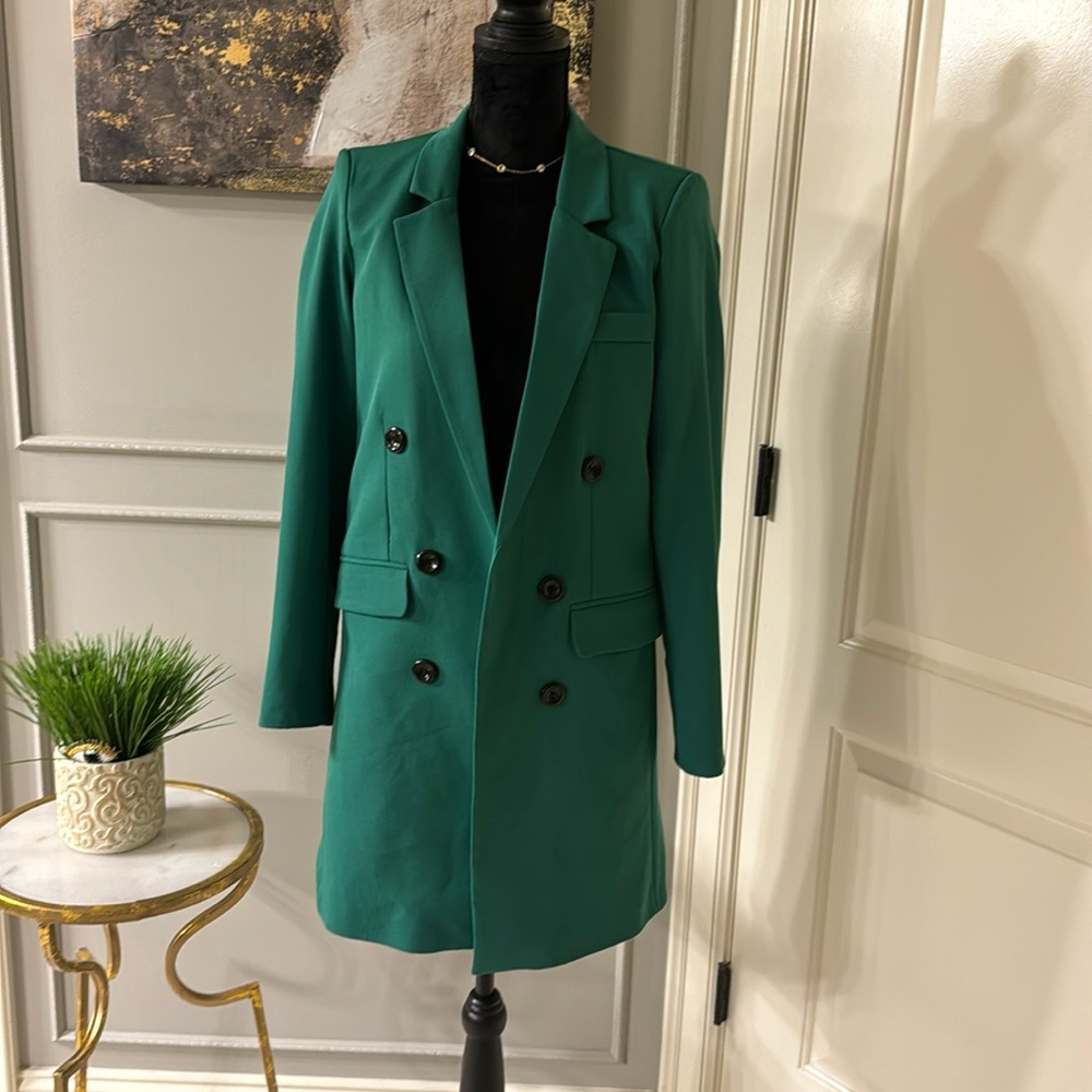 Nice green jacket you can wear it with tight and boots like a dress too size m